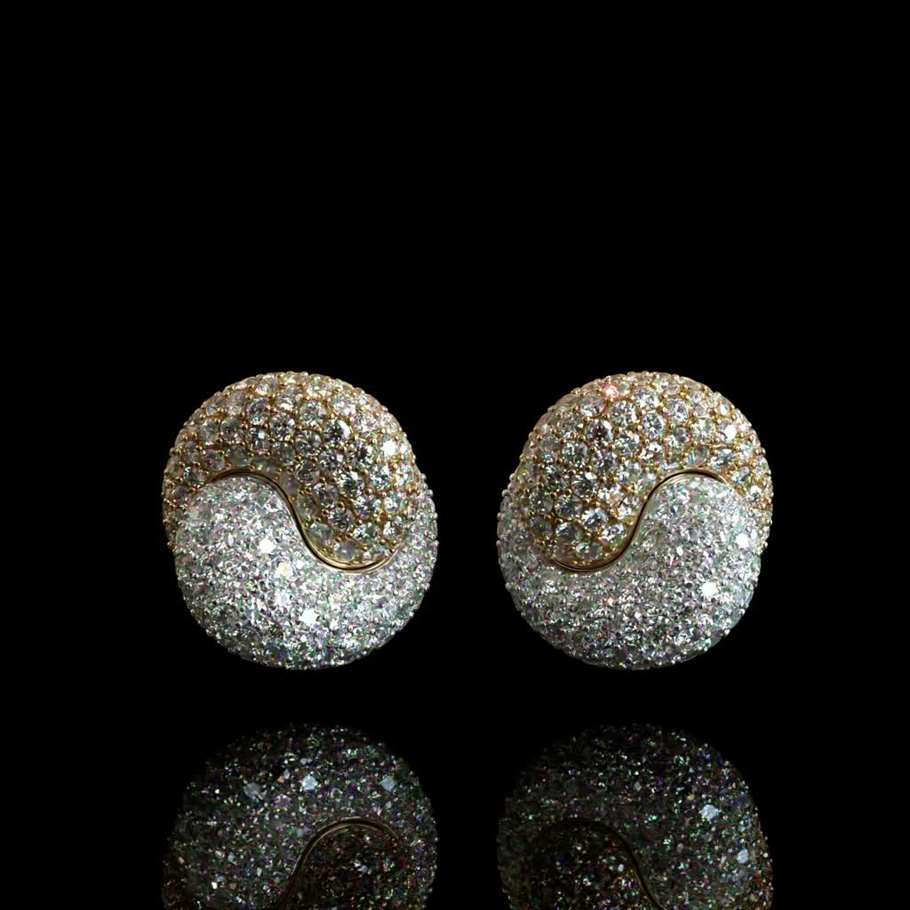 Celestial Spiral Stud Earrings product image on black background